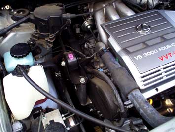Figure 1. Typical automotive under-the-hood environment.