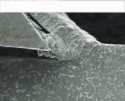 Uncoated tools, severe built-up edge due to large friction coefficient