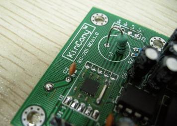 The "analog ground" and "digital ground" of the board are processed separately, and the inductance is used to prevent interference