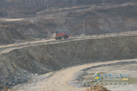 Vehicles driving in molybdenum mining area