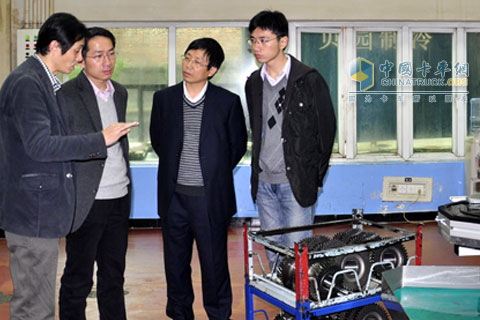 Zuo Yi (Left 2nd) and his delegation visited Yujiang Gear Transmission Co., Ltd.
