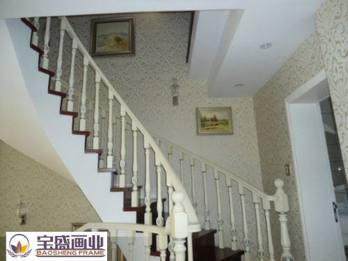 Staircase aisle with paintings