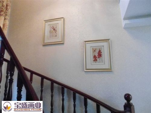 Staircase aisle with paintings