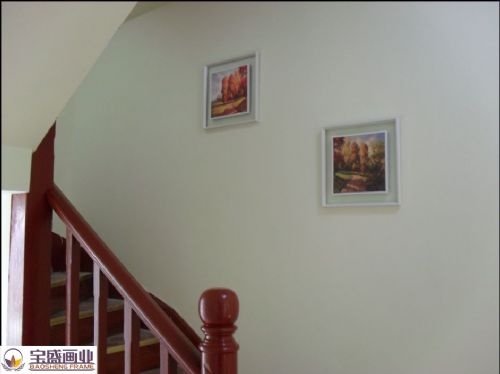 Staircase aisle with paintings