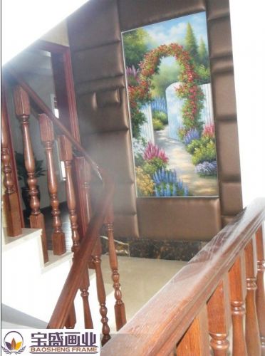 Staircase aisle with paintings