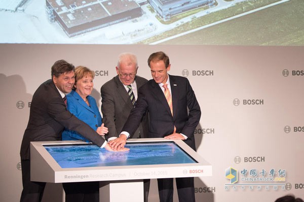 (From left) Dr. Michael-Bolle, President of Bosch Group R&D and Advanced Engineering, German Chancellor Angela Merkel, Governor of Baden-WÃ¼rttemberg Winfried-Kretschmann, and Dr. Volkermar Dunner, Chairman of the Bosch Group ceremony