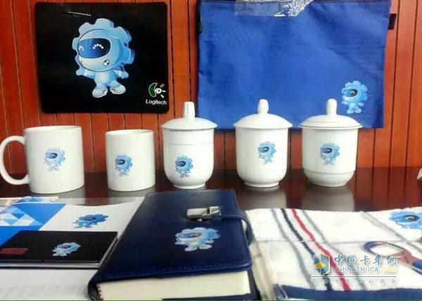 Souvenirs of cups, notebooks, towels, and mouse pads carrying the "magic" image
