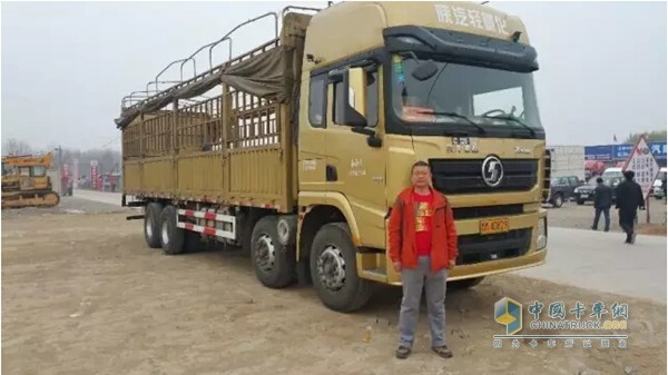 Master Huang and Shaanxi Automobile Cummins Trucks