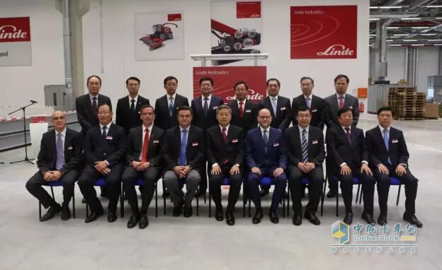Photographs of leaders and guests taking part in the unveiling ceremony of the new factory