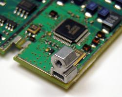 Surface mount circuit board fasteners for automated pick and place assembly operations