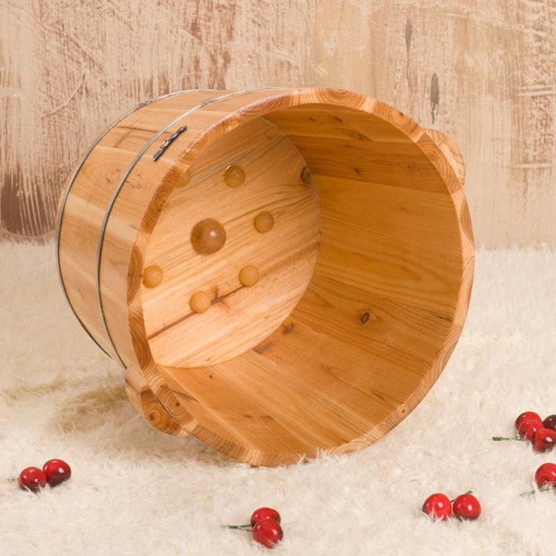 What kind of material is the wooden foot bath barrel?
