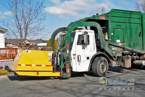 Front loading and unloading garbage truck: visible from garbage loading and unloading