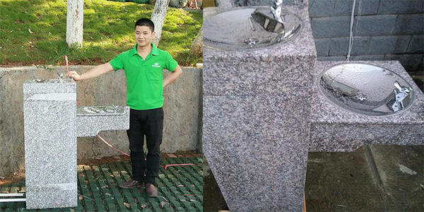 What is the filtration configuration of the school stone drinking fountain?