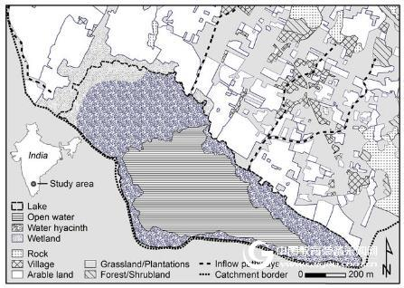 Inhibition of greenhouse gas emissions from a small tropical lake by invasion of large aquatic plants