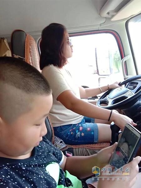 Truck beauty driver driving with children