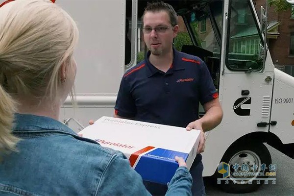 The picture shows Alexis delivering packages in Ottawa.