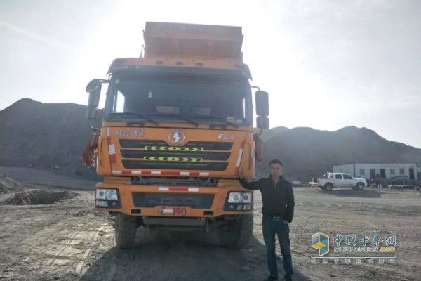 Zheng Qi and his Shaanxi Auto Cummins Dump Truck