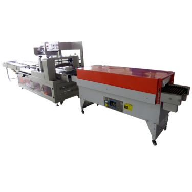 Shrink packaging machine