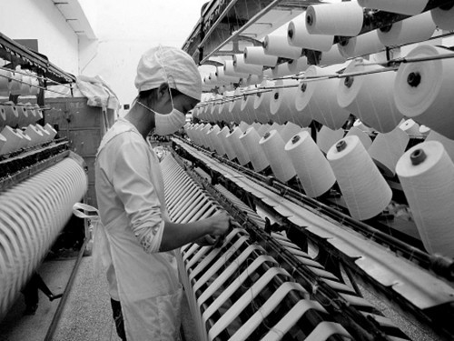 Under pressure, textile companies seek new development