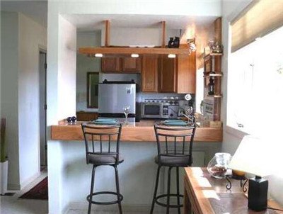 The kitchen bar is decorated to make the kitchen elegant