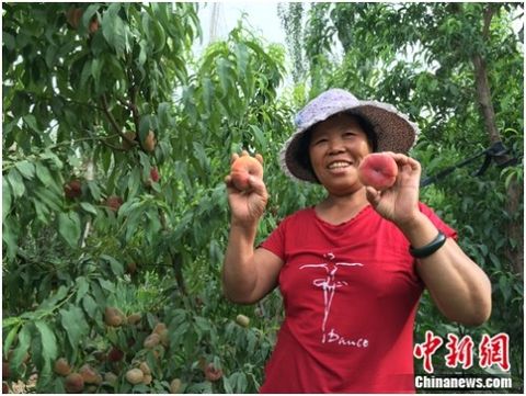 Kang Enfeng, a villager from Kalahong Village, Xingping Township.