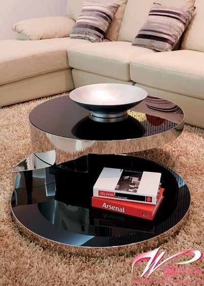 Circling design invisible fulcrum coffee table