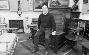 Tom Keane in his furniture warehouse