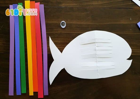 Children's hand-knitted rainbow fish