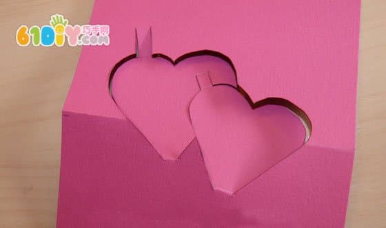 Make a three-dimensional double heart greeting card full of love