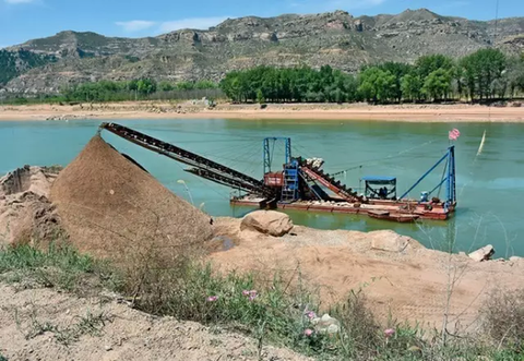 Sand mining field on the bank of the river in Baode County, Shanxi Province