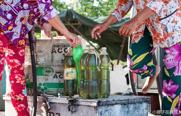 Gas station fuel injectors on the Mekong River directly poured into plastic bottles