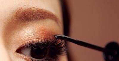 Deep sorrowful golden brown smoked big eye makeup
