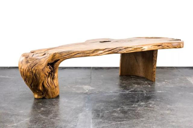 He used discarded wood to make the most beautiful furniture