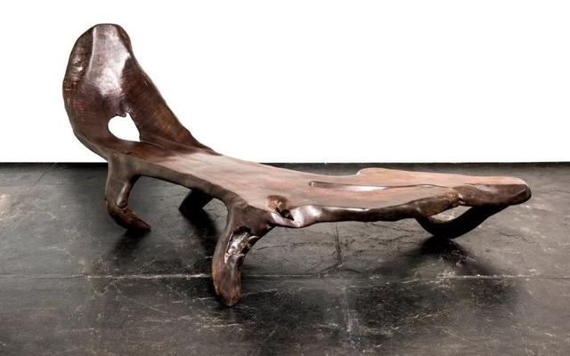 He used discarded wood to make the most beautiful furniture