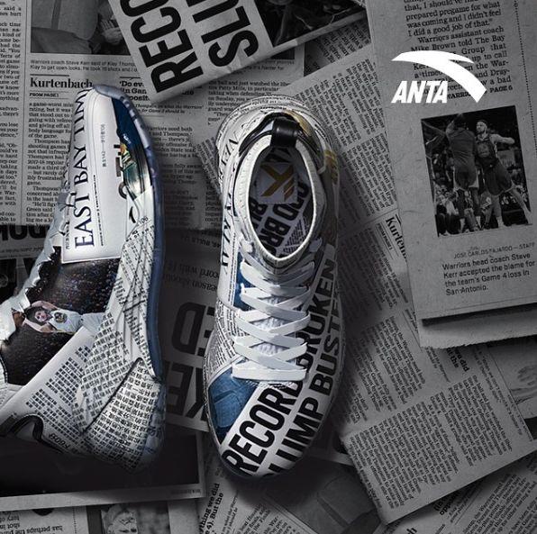 "Newspaper shoes" printed on Thompson's shoes