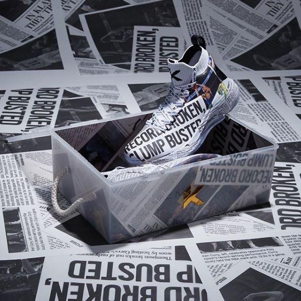 "Newspaper shoes" printed on Thompson's shoes