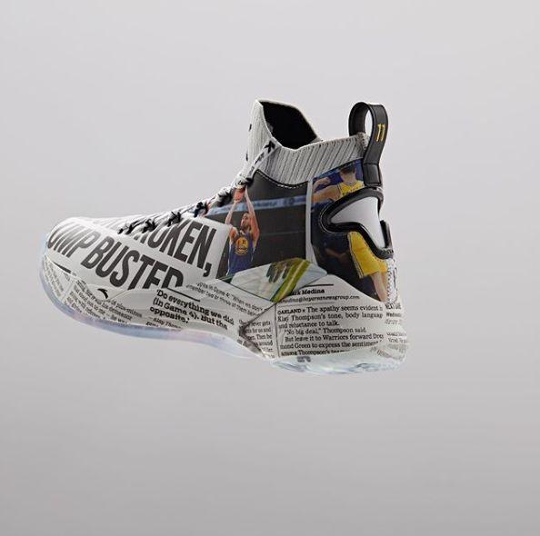 "Newspaper shoes" printed on Thompson's shoes