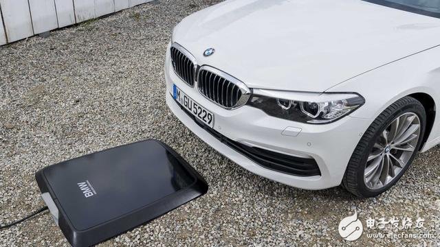 BMW i launches another world-first original integrated inductive charging device for plug-in hybrids