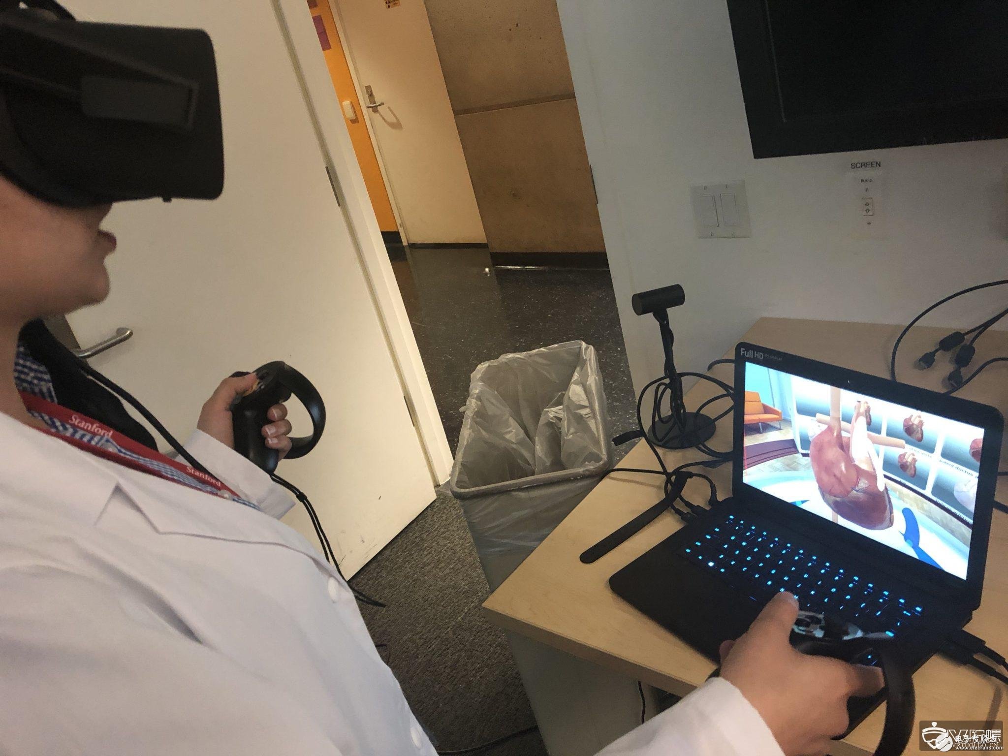 Cardiologist David Axelrod, showing the VR heart model for medical research