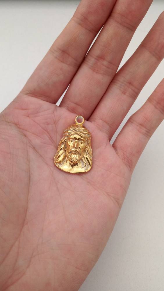 Gold Jesus pendant