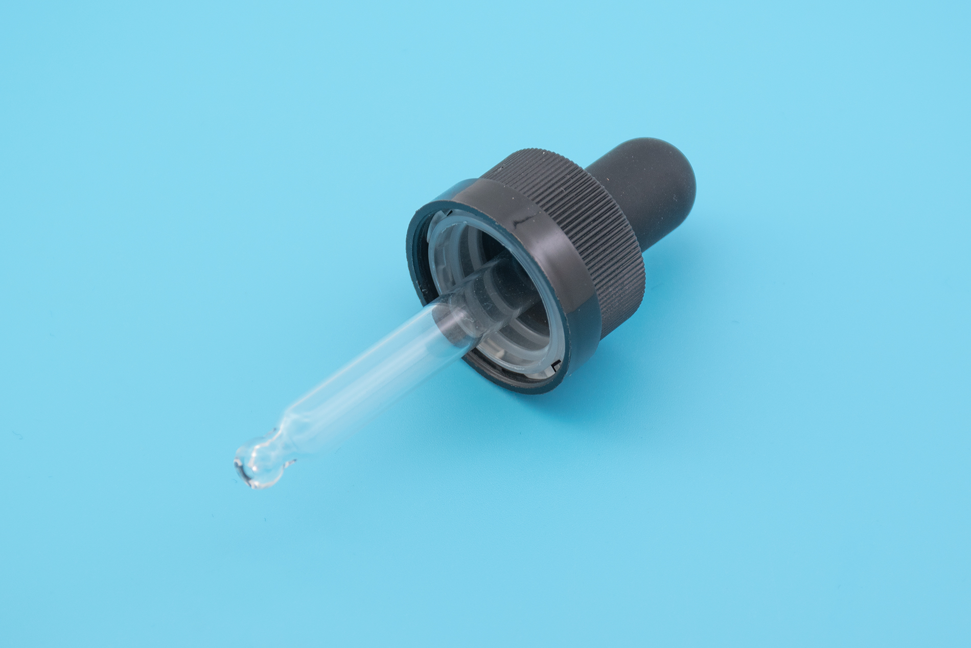 18/400 Black Ribbed Child-Resistant Capable Controlled Dropper Caps 18/400 Black Ribbed Child-Resistant Capable Controlled Dropper Caps