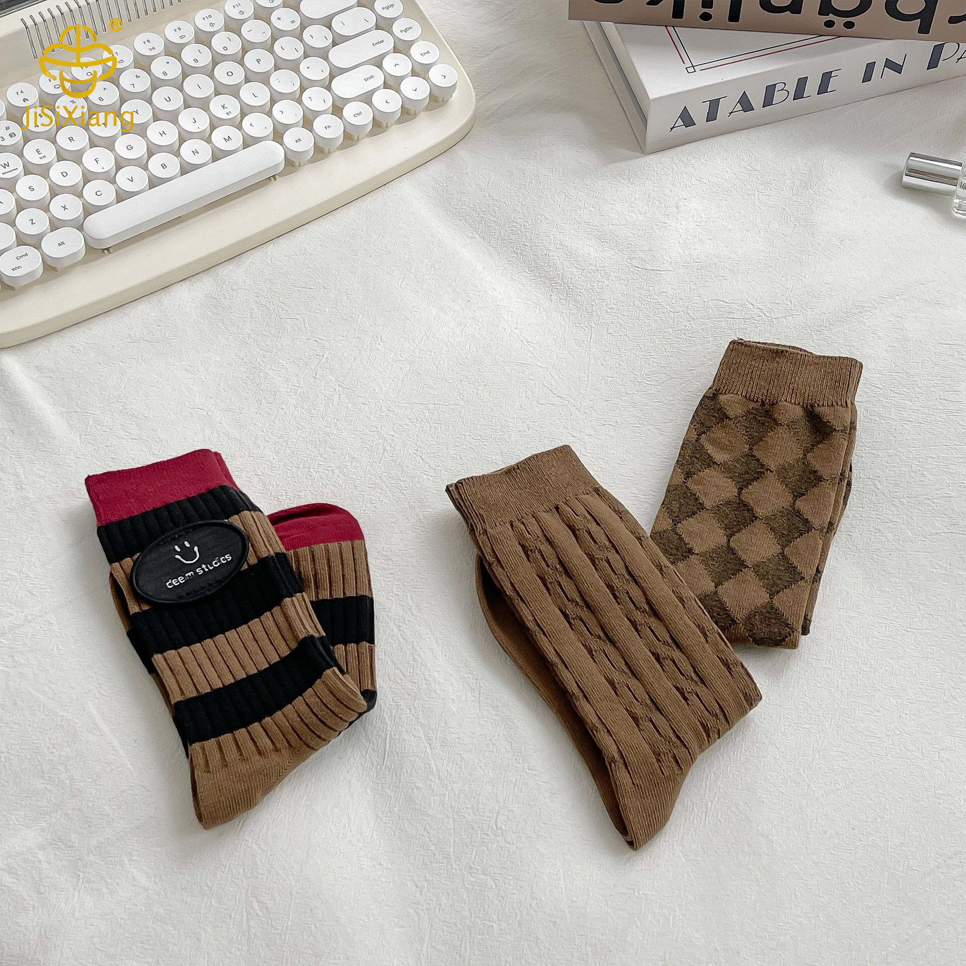version of Miradeb logo with tube socks and pile socks version of Miradeb logo with tube socks and pile socks