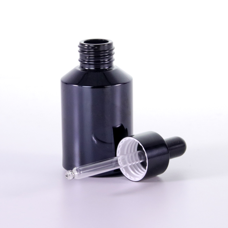 Black oblique shoulder dropper bottle dropper detail Black oblique shoulder dropper bottle dropper detail