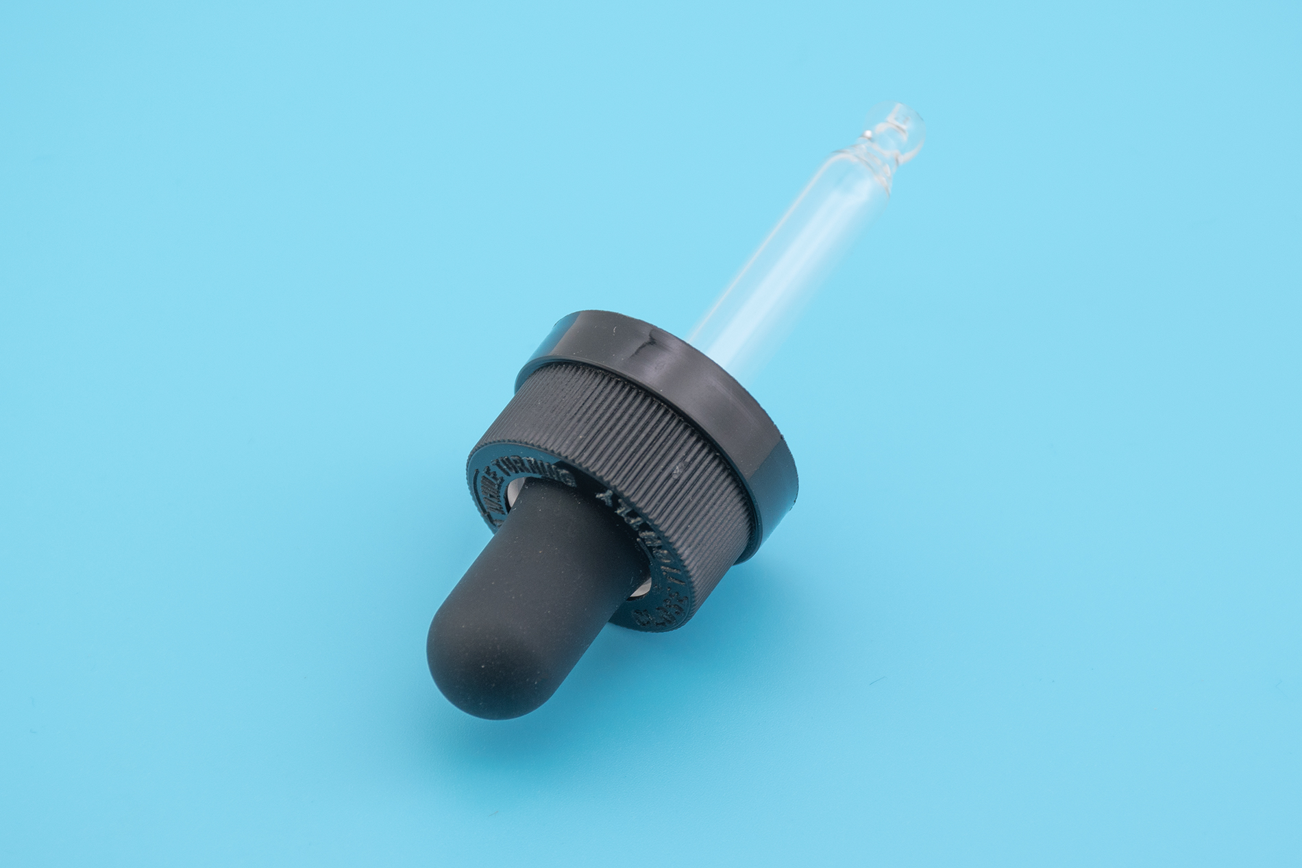 18/400 Black Ribbed Child-Resistant Capable Controlled Dropper Caps 18/400 Black Ribbed Child-Resistant Capable Controlled Dropper Caps