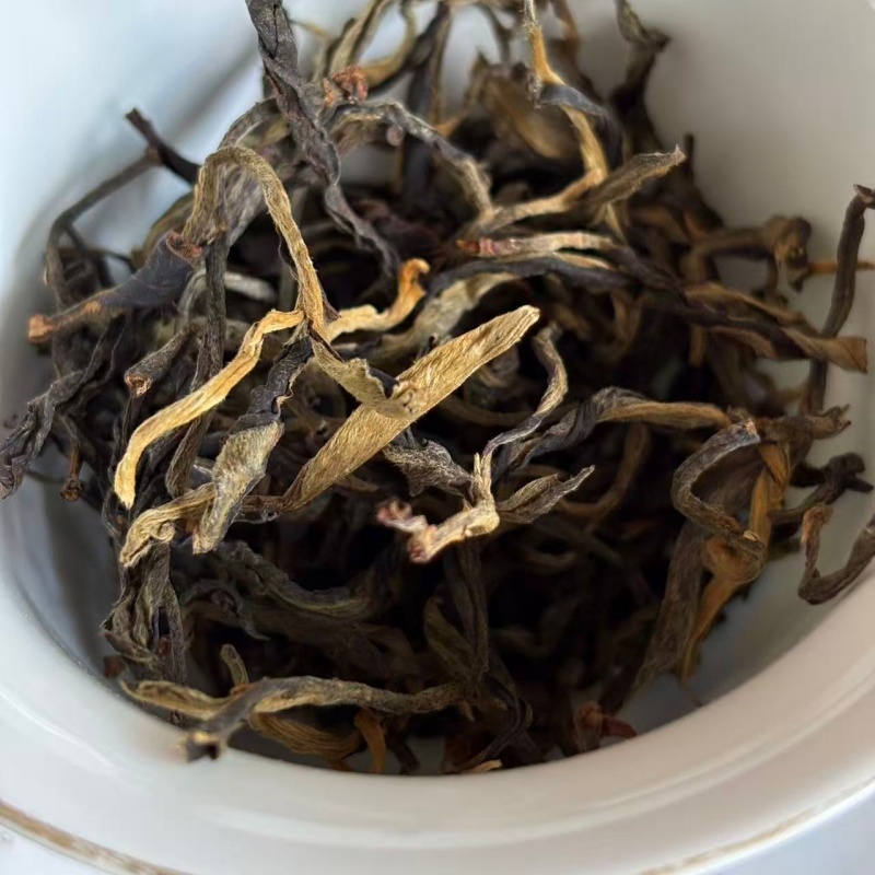 Mengku spring sun dried black tea golden hair dry tea close-up shot Mengku spring sun dried black tea golden hair dry tea close-up shot