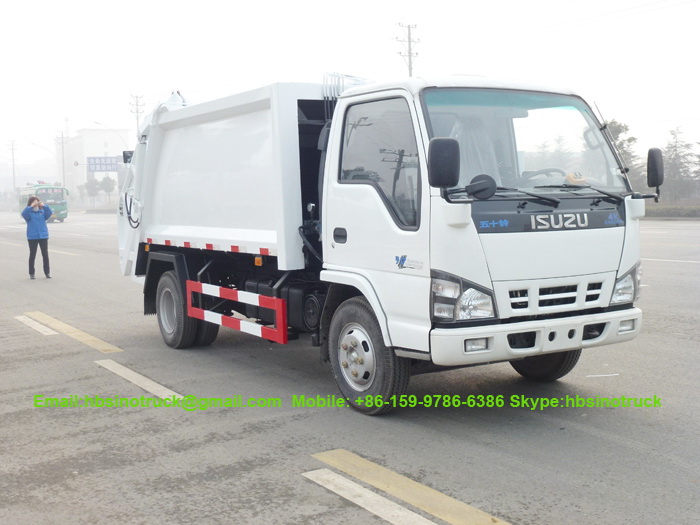 ISUZU ELF 6 CBM Garbage Compactor Truck suppliers,China 