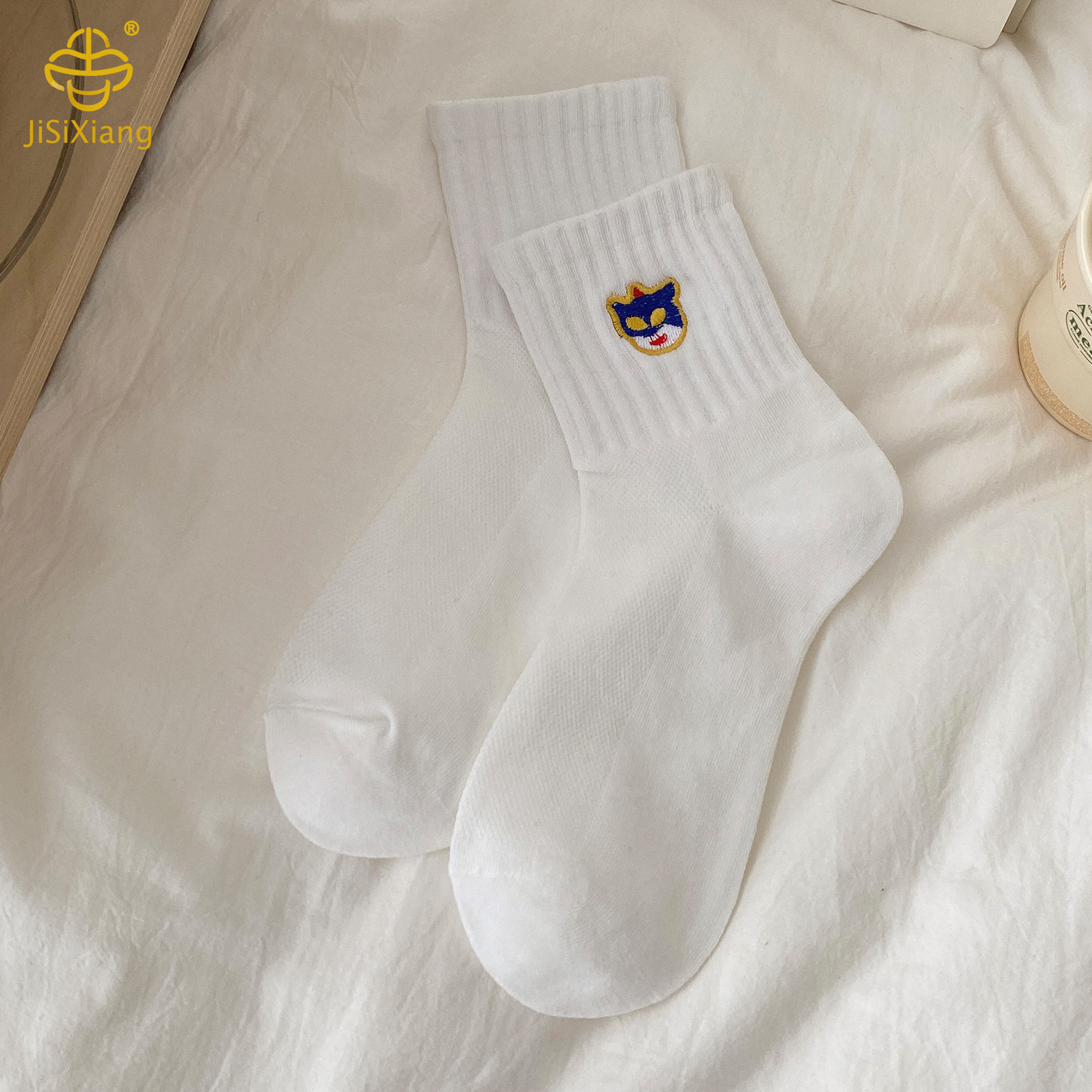 Character embroidered tube socks Character embroidered tube socks