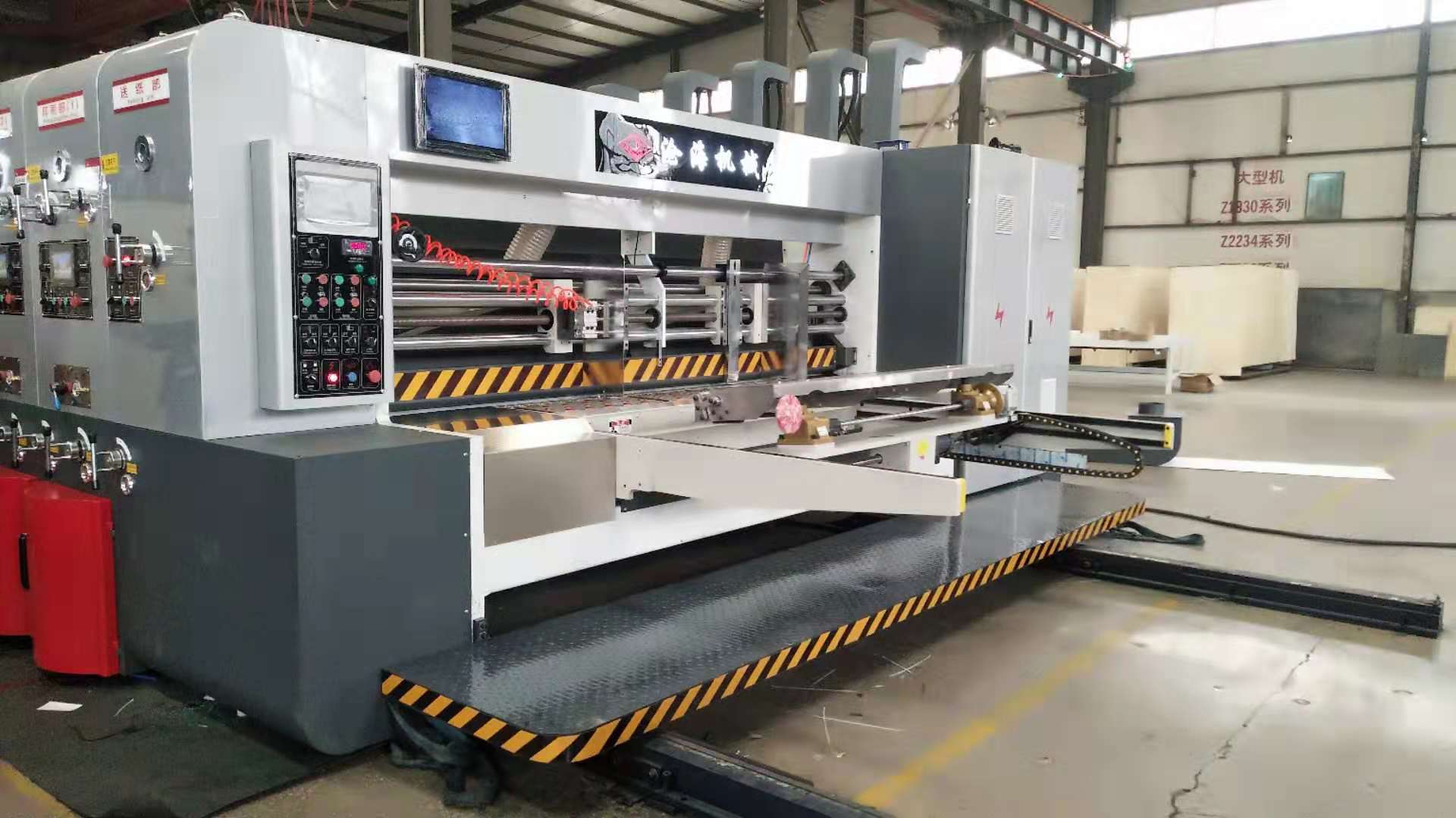 ZYKM-1224/1428/1630/1836/2536 Corrugated paperboard boxes Flexo printing slotting die cutting machine with stacker2 ZYKM-1224/1428/1630/1836/2536 Corrugated paperboard boxes Flexo printing slotting die cutting machine with stacker2