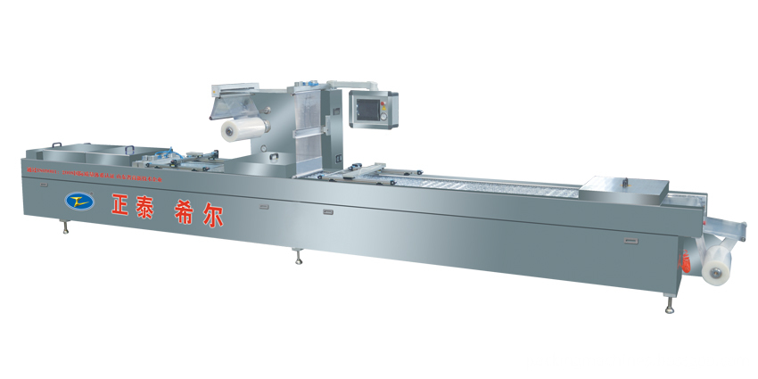 Automatic vacuum forming machine