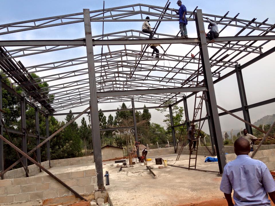 Fitting the purlins to hold the roofing sheets-warehouse
